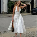 Halter Plunging V-Neck Drop Waist Pleated Fit and Flare Midi Dress