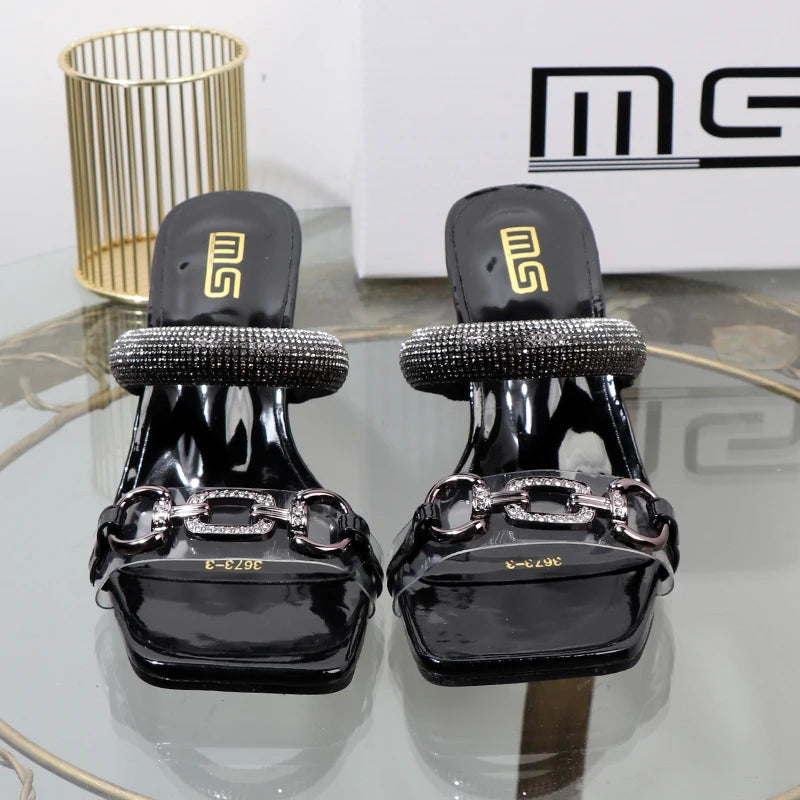 Transparent belt with metal decoration and box-shaped square Alien heel high heels