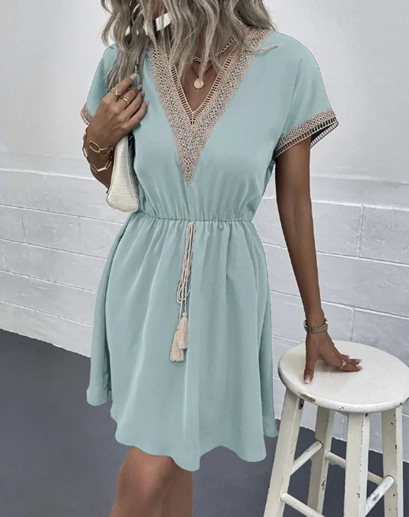 Crochet Trim Deep V-Neck Tassel Waist Cinched Mini Dress