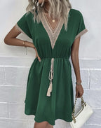 Crochet Trim Deep V-Neck Tassel Waist Cinched Mini Dress