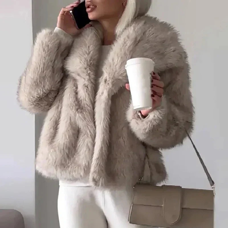 | Women’s Relaxed Fit Faux Fur Jacket