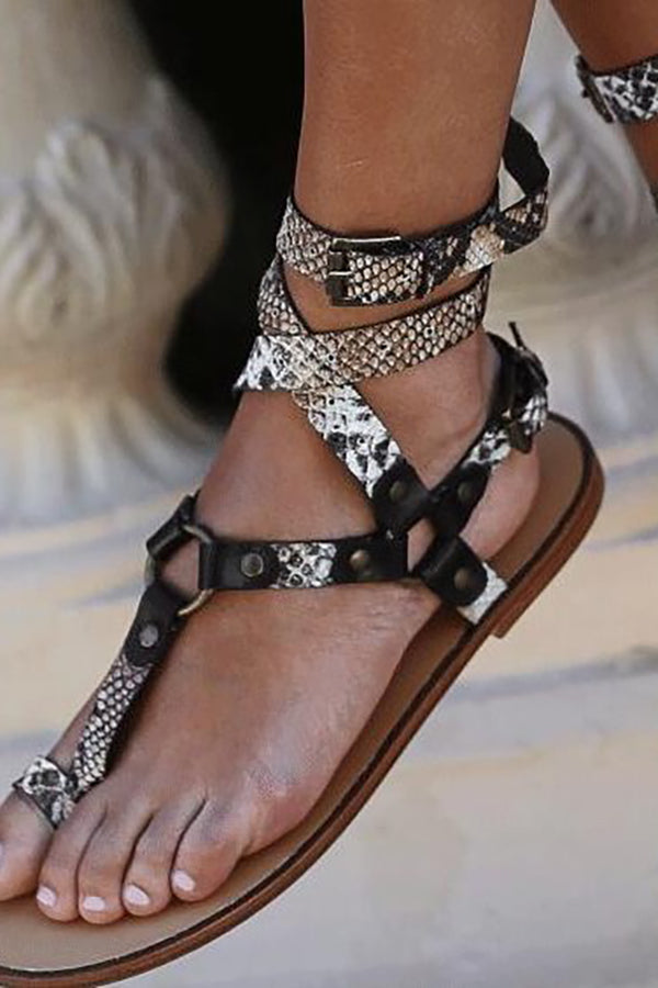 Stylish Round-toe Sandals Featuring A Snakeskin Print and Crisscross Straps.