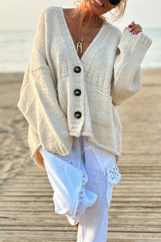 | Solid color loose long sleeve knitted sweater with V-neck and pocket