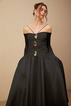 Nadine off-shoulder panelled maxi dress in Black