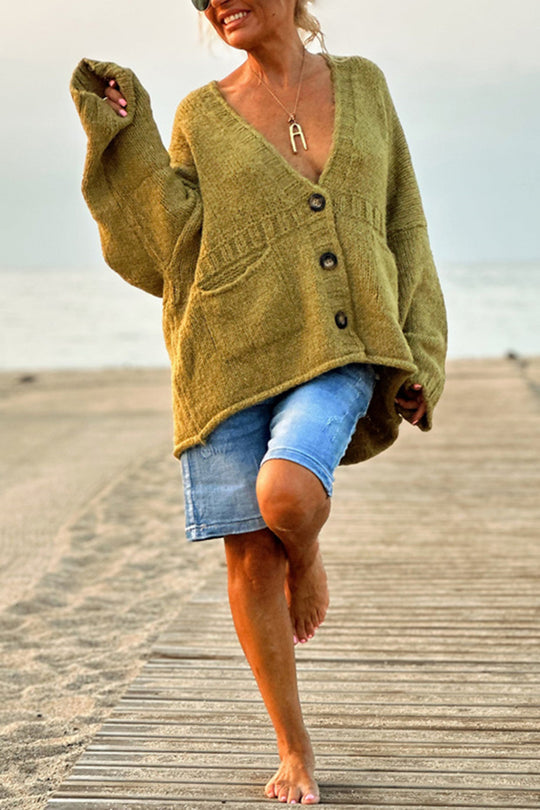 | Solid color loose long sleeve knitted sweater with V-neck and pocket