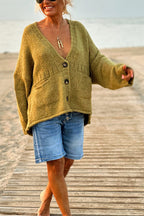 | Solid color loose long sleeve knitted sweater with V-neck and pocket