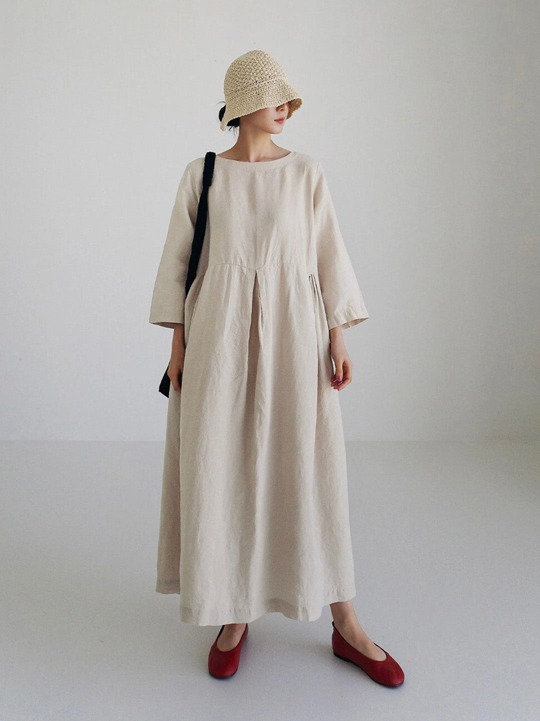 | Loose linen dress with side pockets
