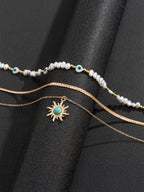 Turquoise and Pearl Layered Necklace with Bohemian Sunburst 디자인