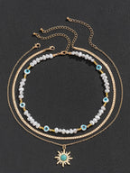 Turquoise and Pearl Layered Necklace with Bohemian Sunburst 디자인