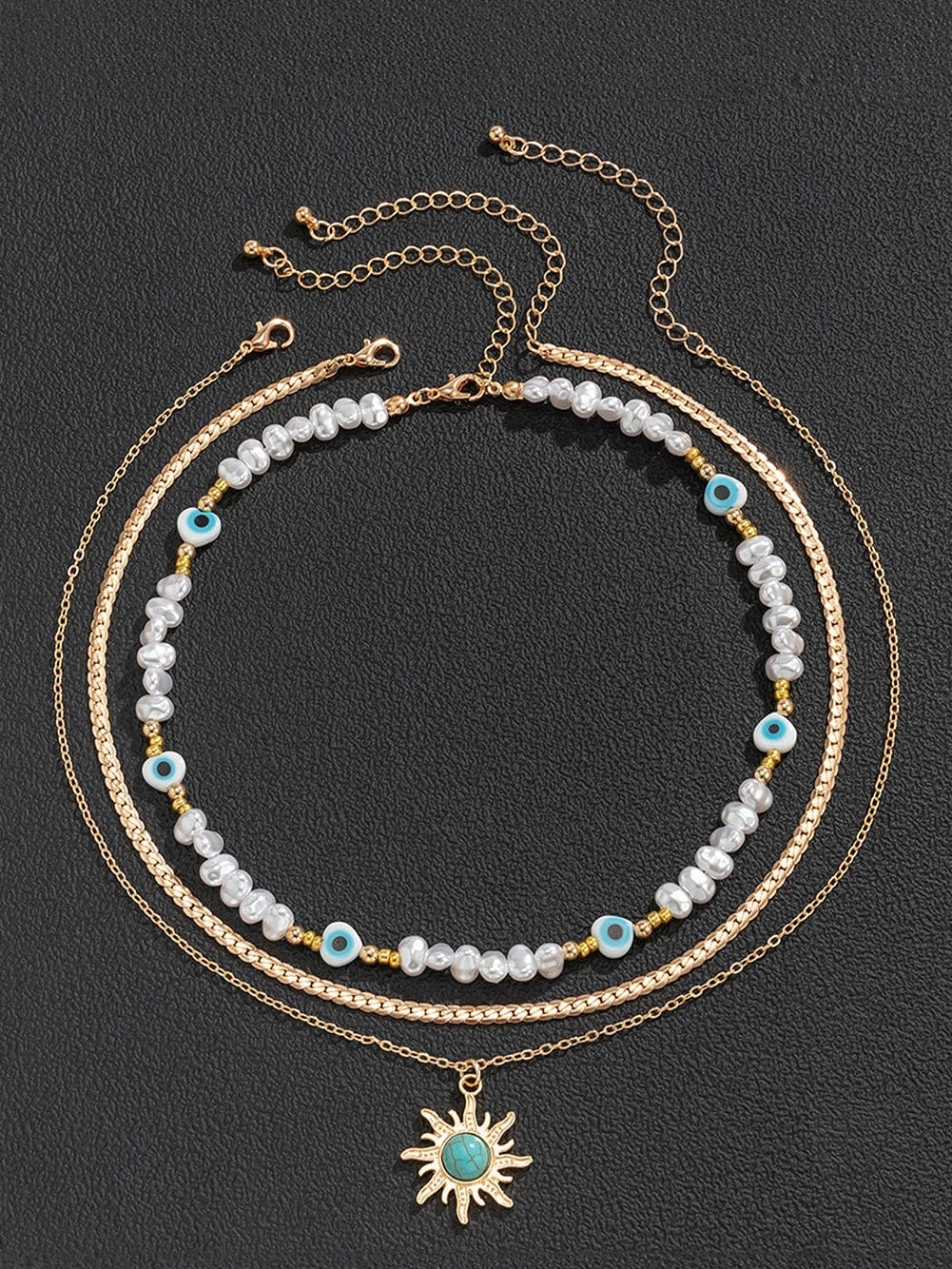 Turquoise and Pearl Layered Necklace with Bohemian Sunburst 디자인
