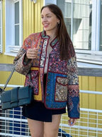 | Floral print coat with patchwork pockets