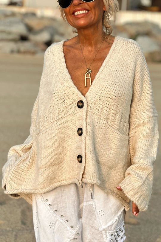 | Solid color loose long sleeve knitted sweater with V-neck and pocket