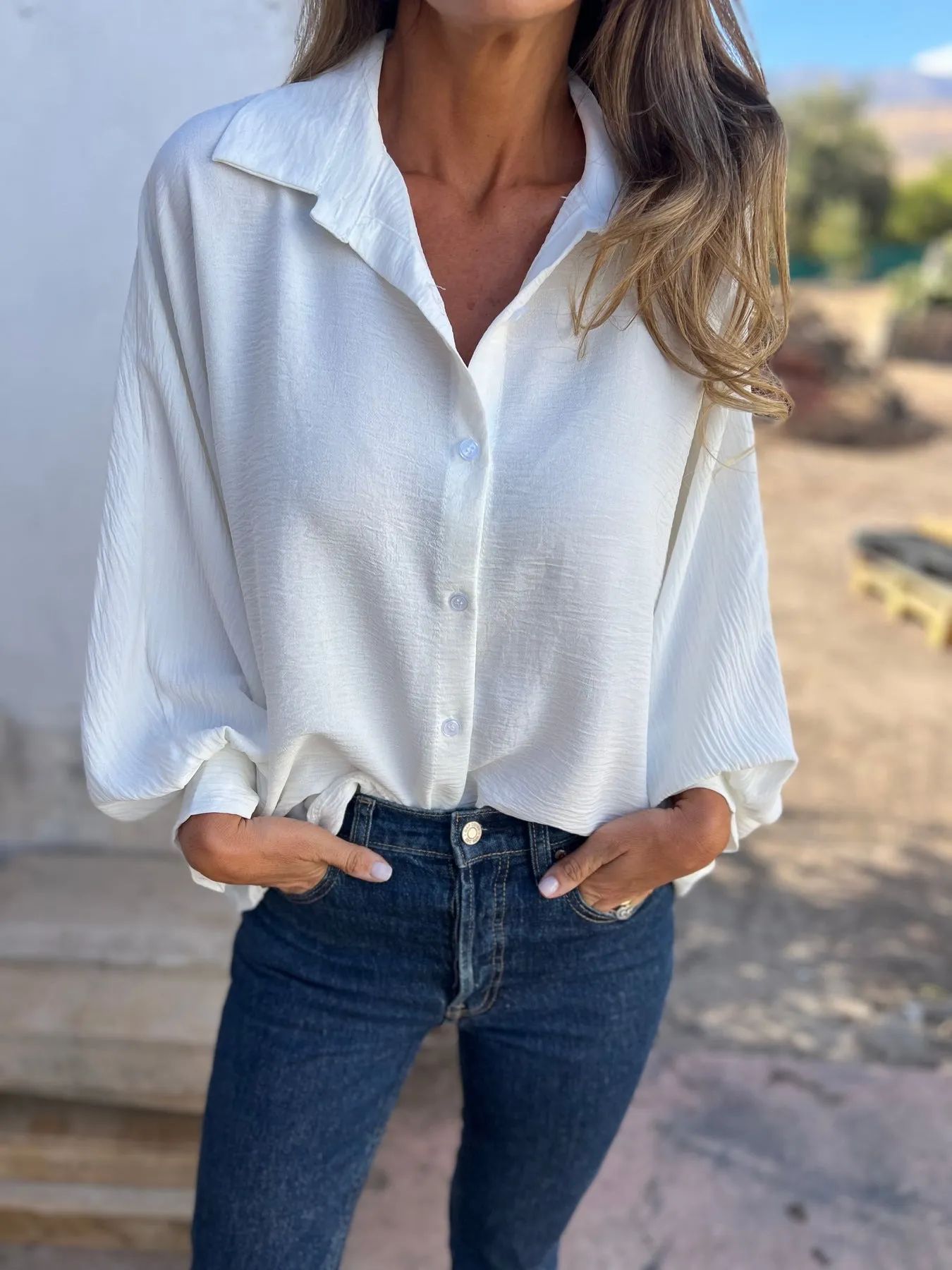Elegant plain button-up shirt for women