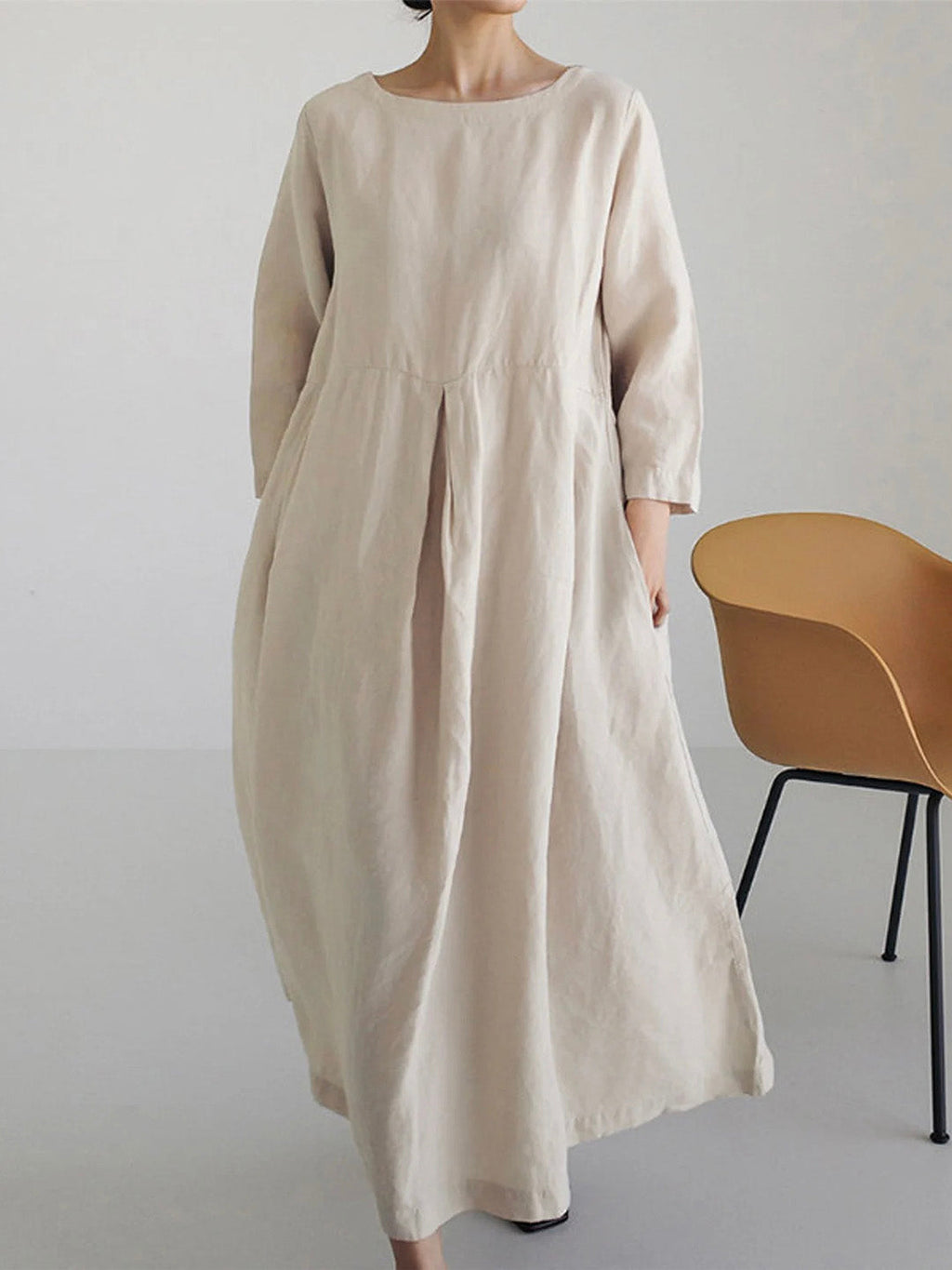 | Loose linen dress with side pockets