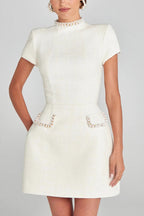 Leslie Timeless Exquisite and Playful Mini Dress Made of Tweed Fabric with Beaded Trim, Short Sleeves and Pockets Elevated Occasion Wear