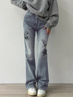 Star Letter Graffiti Print Flare Jeans