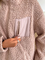 | Fluffy jacket with long sleeves and zip