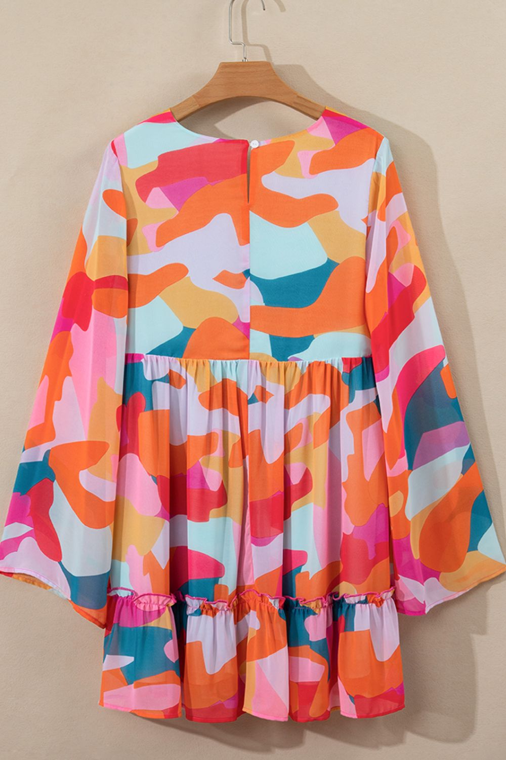 Laura Effortless Long Sleeve Mini Dress with Ruffle Hem and Color Block V Neck Statement Occasion Edit