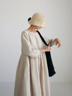 | Loose linen dress with side pockets