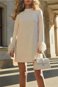 | Mini dress with feather trim and long sleeves in H-line