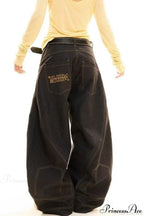 Drapey Curved Wide-Leg Floor-Length Jeans