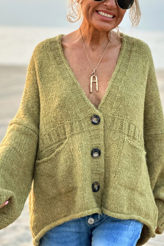 | Solid color loose long sleeve knitted sweater with V-neck and pocket