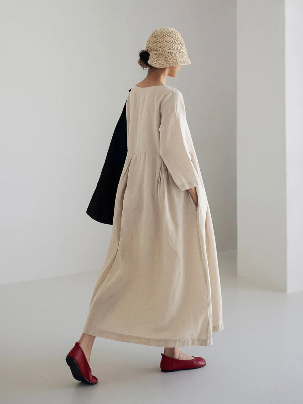 | Loose linen dress with side pockets
