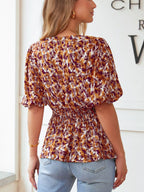 Abstract Print V Neck Smocked Babydoll Blouse