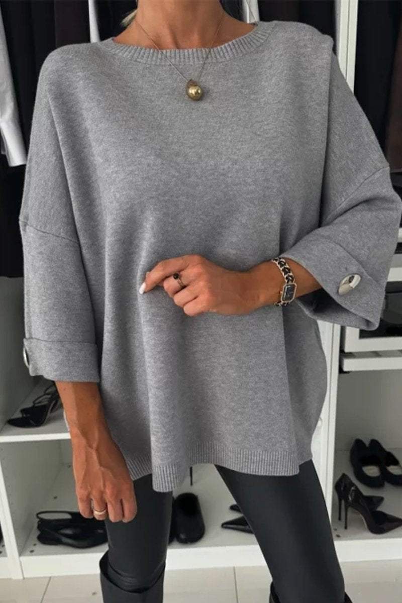 | Knitted sweater with button detail and half sleeves