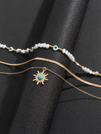 Turquoise and Pearl Layered Necklace with Bohemian Sunburst 디자인