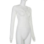 Fluffy patchwork solid long sleeve self tie top