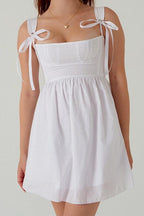 Renata Timeless Mini Dress with Bow and Shoulder Straps Designer Edit