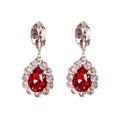 Red Pear Cut Gem Dangle Earrings Silver Plated