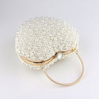 Beige Heart Shaped Clutch Bag with Luxury Metal Handle and Pearl Beads