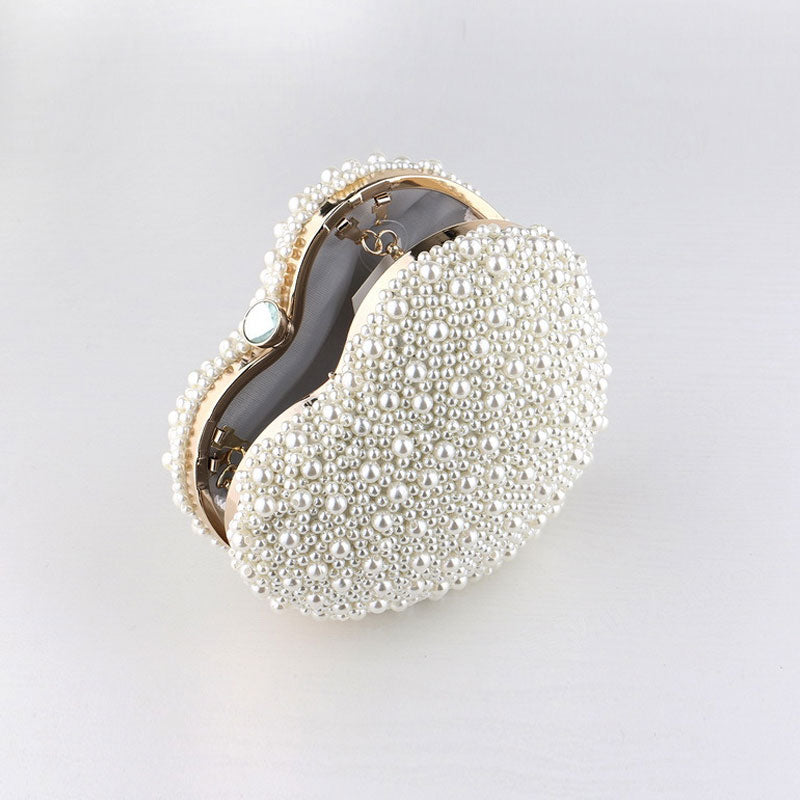 Beige Heart Shaped Clutch Bag with Luxury Metal Handle and Pearl Beads