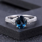 Cubic Zirconia and London Blue Topaz Halo Ring