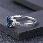 Cubic Zirconia and London Blue Topaz Halo Ring