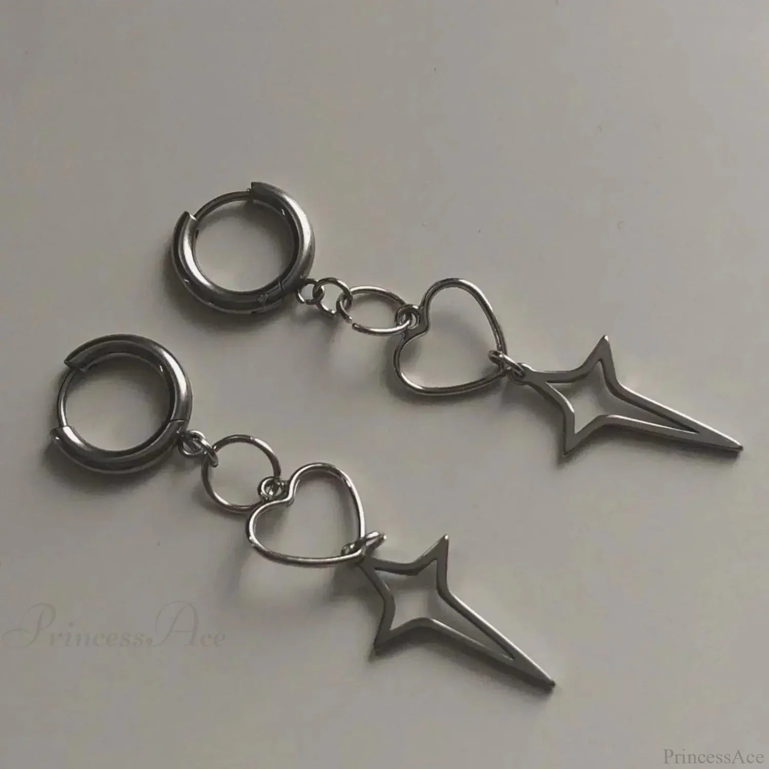 Rebel Celestial Cross Silver Empty Heart Earring
