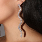 Silver Long Drop Earrings with Sparkly Wavy Rhinestone Embellishments