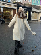 Tassel Turtleneck Irregular Button Overcoat